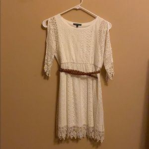 White lace dress with cold shoulders and a belt
